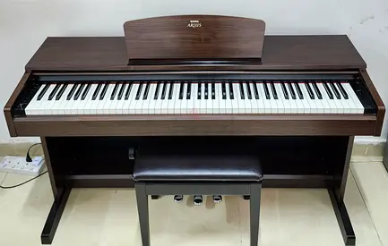 The Yamaha Arius YDP-140 is an 88-key entry-level digital home piano featuring Graded Hammer Standar