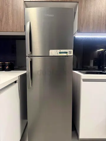 Used stainless steel top-freezer refrigerator - Good condition