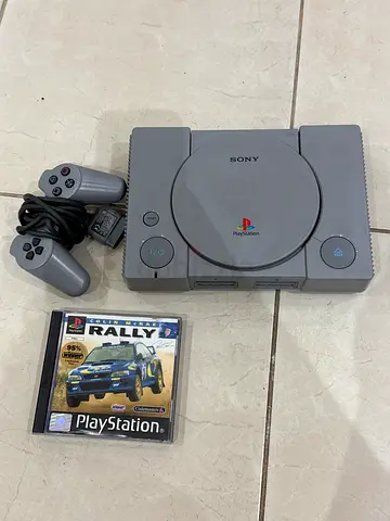 PlayStation 1 with 1 controller and 1 game