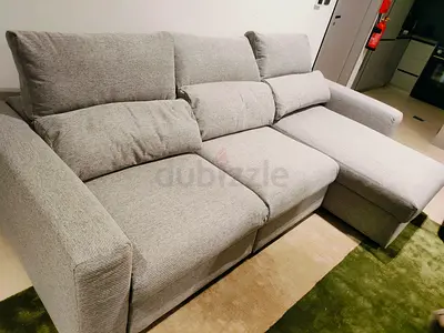 Ikea gray Eskilstuna sofabed with storage