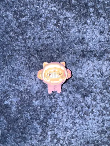Pink sleeping mini figure