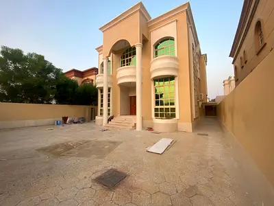 Villa in Al Muwaihat 2 for rent, 6 master bedrooms, majlis, living room with kitchen and maid's room