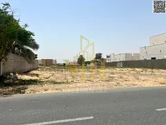 Prime residential land for sale in Al Hooshi, Sharjah, near the mosque and service road. 10,000 sq f