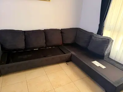 L-shaped fabric corner sofa bed (right-side chaise) - used, good condition