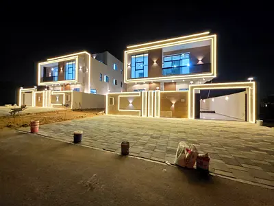 Villa for sale in Al Bahia, Ajman. 7 master bedrooms, large majlis, large living room, kitchen, 3 floors.