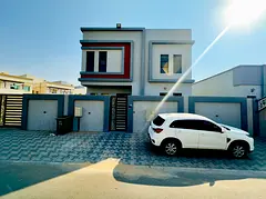 Corner villa for sale in Al Zahiyah area, Ajman. Price includes electricity, water, and air conditio
