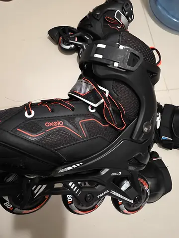 Unisex Inline Rollerblades (size 35-38) - good used condition - black orange - with protection set