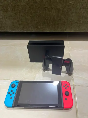 Nintendo Switch console with dock and Joy-Con (Neon) with charger comes with everything but box