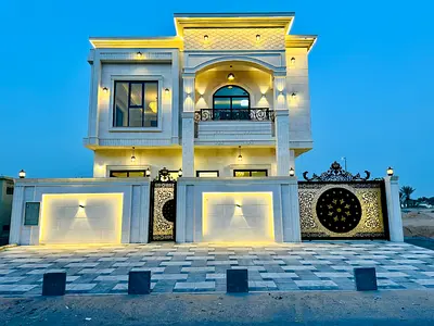 For sale, a classic villa in Al Helio 2, Ajman, with personal finishing, consisting of 5 master bedrooms, a living room, and a hall.