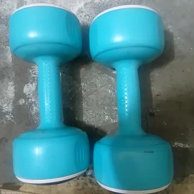Pair of light aqua plastic dumbbells - good condition