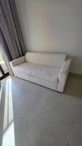 Italian two seater sofa bed with mattress