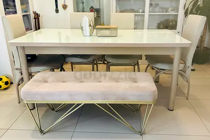 Dining table with chairs and lounge