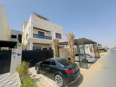 For rent in Al Helio, a two-story villa with a roof, furnished, 5 rooms, a living room, 2 halls, and a maid’s room, spacious area