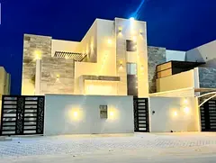 Villa for rent in Al Zahia, 4 master bedrooms, living room, majlis, maid's room, built-in wardro