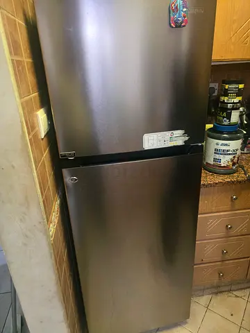 GE Top-Freezer Refrigerator - Stainless Steel, Good Working Condition