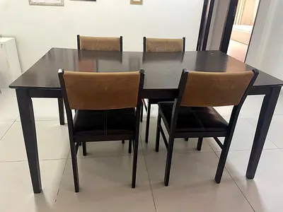 Dark colured 4-Seater Dining Table with Upholstered Chairs