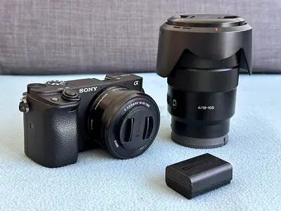 Sony Alpha Mirrorless Camera with 16-50mm and 18-105mm Lenses + Spare Battery