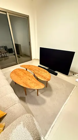 Set of 2 solid wood coffee tables in organic shape- from OC Home. Stylish and modern