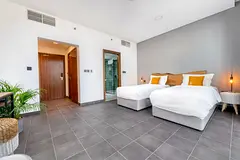 Standard room for sharing available in dubai sports city for AED 1666 per month including all bills
