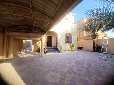 Villa for rent in Al Rawda 1, Ajman. 5 master bedrooms, living room, majlis, kitchen, and maid's room.