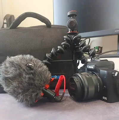 Canon M50 Mark ii with Accessories (Camera Bag, Portable Stand, RODE Microphone, and SD Cards)
