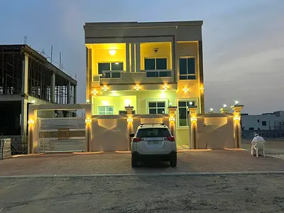 For sale in Al-Haliyo 2 area on the main street, price including registration fees: five rooms, living room, hall, and maid's room