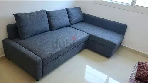 Grey L-shaped Sofa with Storage — Good Condition