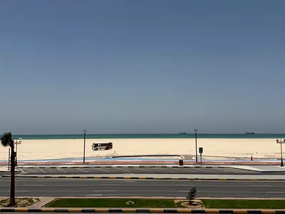 One bedroom and living room, 3 balconies, full sea view on Ajman Corniche, brand new kitchen and excellent finishes