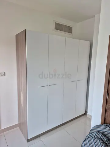 4-Door Wardrobe / Armoire in White  Wood Finish - As New Condition