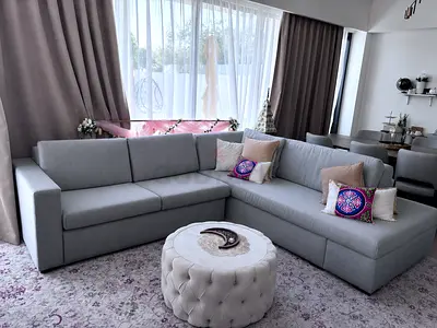 Light grey L-shaped sectional sofa, ottoman and armchair — great condition