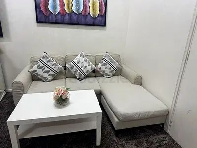Home center sofa with center table in excellent condition