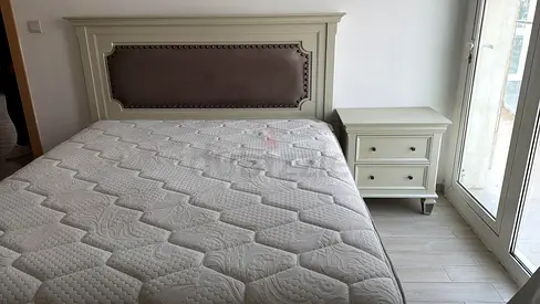 King size bed and side table