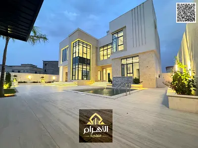 Own the largest villa in Al Yasmin area, 8000 sq ft, with 6 bedrooms, a swimming pool, and a large