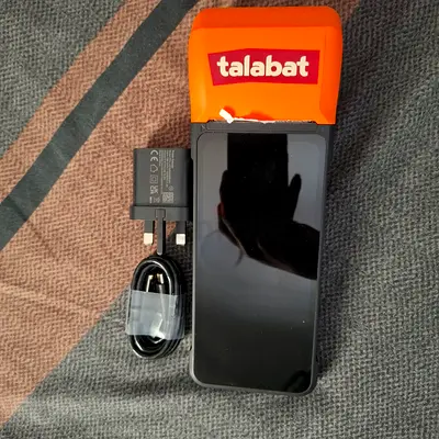 Used Android smartphone with Talabat payment device + charger