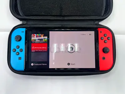 Nintendo Switch (Neon Blue/Red) with Carry Case — have network issues only physical game playing