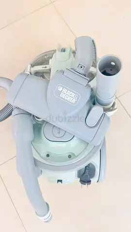 Black  Decker 2000w Canister Vacuum Cleaner - Good Working Condition. Has with Asian round plug