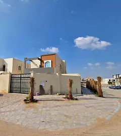 For sale: Corner villa in Al Muwaihat 1, five bedrooms, living room, maid's room with external m