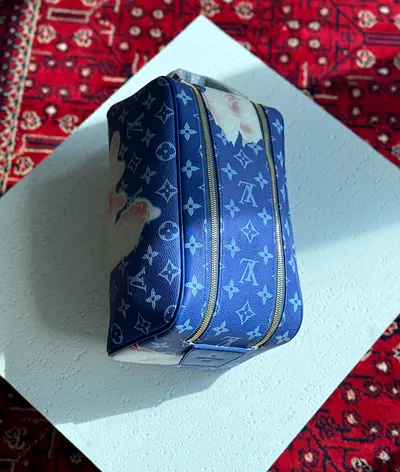 Louis Vuitton Dopp kit in the blue
