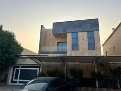 Villa for rent in Al Yasmin, 5 master bedrooms, living room, majlis, kitchen and maid's room