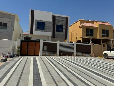 للبيع فيلا خمس غرف نوم ماستر ومجلس مستقل وصاله وملحق خارجي مع مطبخ وجلسه خارجيه في المويهات 1بعجمان
