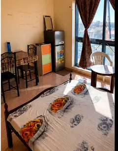 Furnished master bedroom with attached bathroom available for Indian family in town center al ain