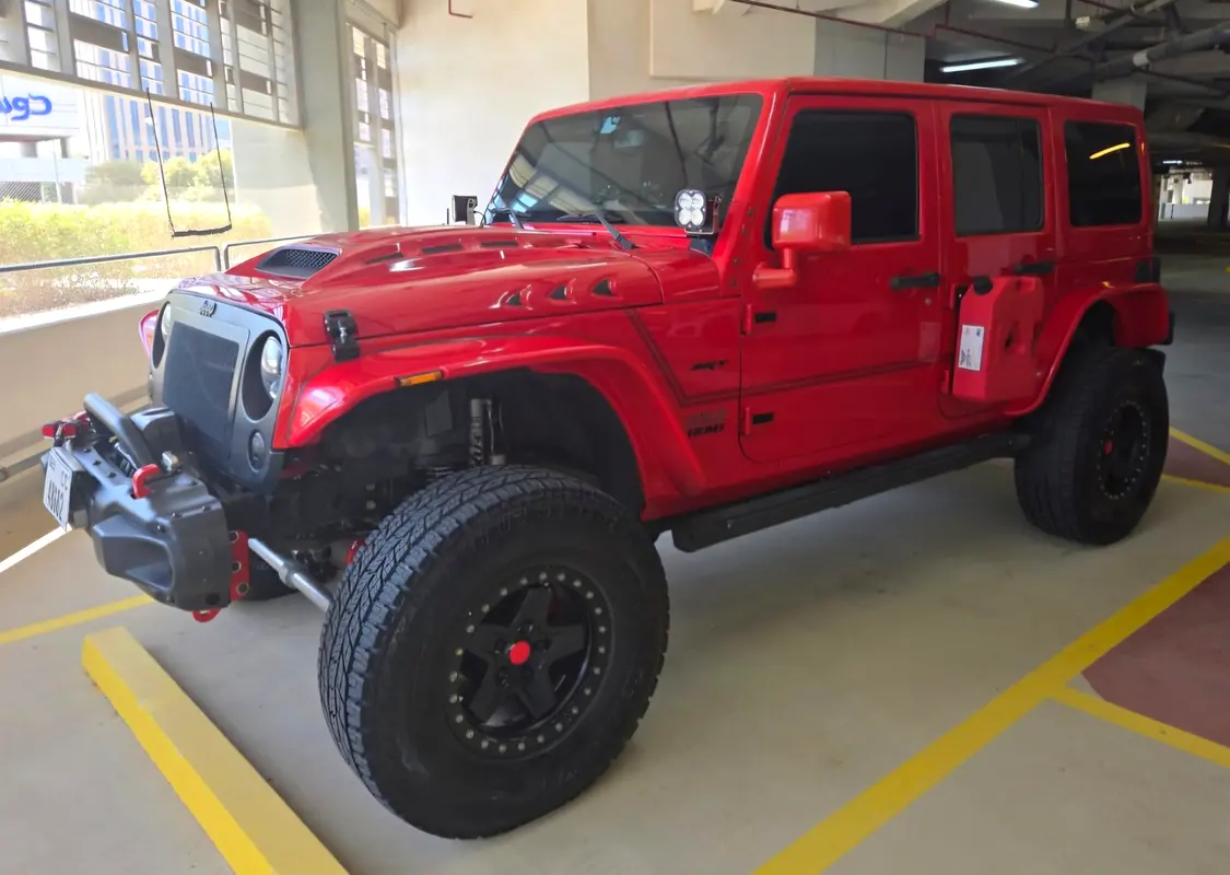 Jeep Wrangler Unlimited 2014 — photo 1 of 4