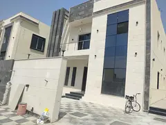 For sale in Al Zahia: a villa with 4 master bedrooms, a majlis (formal sitting room), a living room,