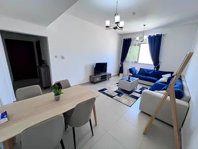 One bedroom and living room for monthly rent in Ajman Corniche - first occupancy - balcony - 2 bathrooms - central air conditioning - includes bills,