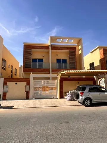 Villa for rent consisting of five master bedrooms, a majlis (formal sitting room), a living room, a maid's room, a main kitchen, a preparation kitchen