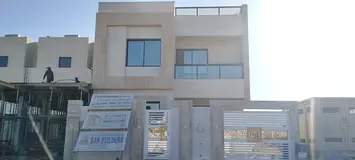 Villa for rent in Ajman Al bahia on the corner of two streets, beautiful location, payment facilitie