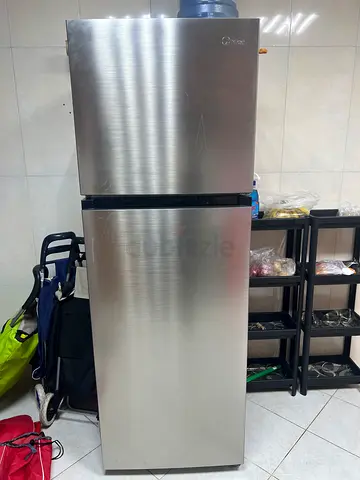 Stainless Steel Top Freezer Refrigerator - Good Condition