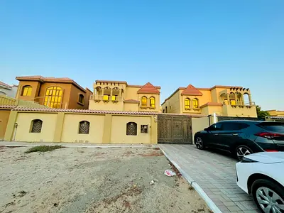 Villa for rent in Ajman Al Muwaihat 2 on the corner of two streets, beautiful location, payment facilities