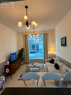 One-bedroom apartment with a living room for monthly rent in Ajman