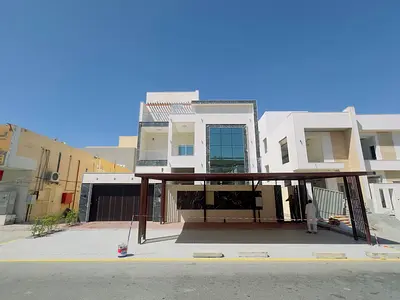 For sale in Rawdah, two floors and a roof directly on Sheikh Ammar Street, a VIP villa Five rooms, a living room, two halls, and a maid's room